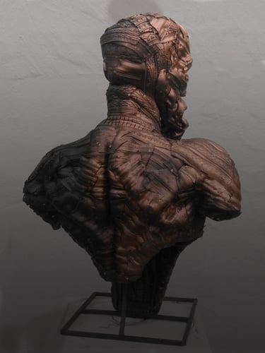 Sculpture made by recycling old bicycle tyres over a welded steel frame. Recycled sculpture