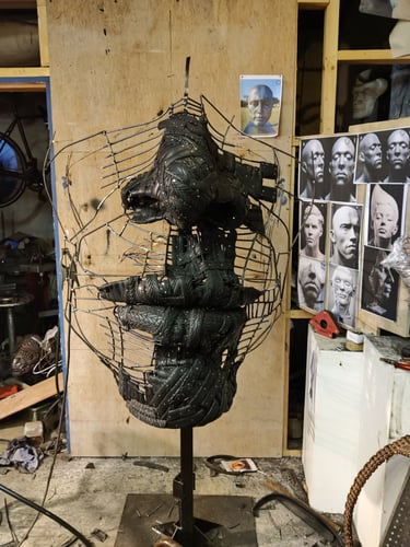 'Covid', commissioned by Feile Na Bealtaine festival. Recycled bike tyres,steel and fabric.