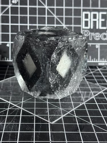 photo of a 3d printed alien eye rock 
