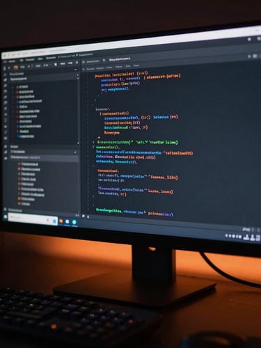 Macro shot of a high-end developer workspace, clean code editor on a 4K monitor with a subtle orange ambient glow, dark editorial technology photography, low-key lighting