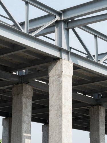 Architectural photography of exposed steel framework and industrial concrete columns, sharp geometric lines, bright daylight with high-contrast cool shadows, 35mm lens