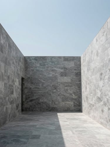 Minimalist Mexican architectural courtyard with clean lines, soft natural daylight reflecting on cool gray stone walls, 35mm lens, architectural photography