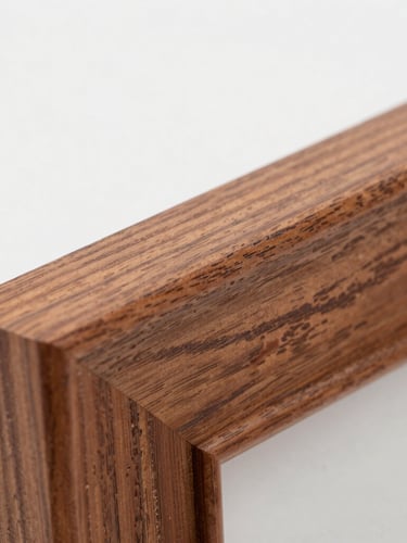 Close-up of a hand-assembled wooden photo frame, rich wood grain details, macro shot, soft studio lighting