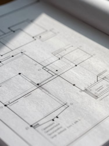 Extreme close-up of a complex operational blueprint on physical planning paper, natural high-contrast side-lighting casting sharp shadows across hand-drawn flowcharts and architectural alignment lines, cool clean tones, shallow depth of field.
