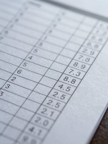 Macro shot of a high-quality textured paper document with financial columns, minimal and elegant, cool corporate lighting.