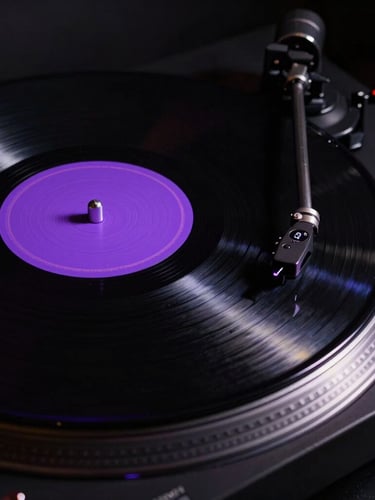 Portrait close-up of a physical vinyl record spinning on a high-end black turntable under single-source plasma-violet strobe light, deep shadows.