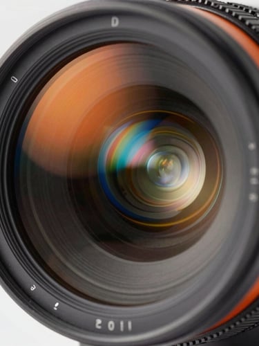 Extreme close-up of a high-end cinema camera lens with vibrant orange and electric blue gel reflections, sharp focus, 35mm.