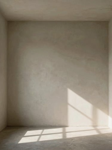 Straight-on architectural elevation of a minimalist room, raw plaster walls, soft natural daylight from a high window casting quiet shadows, no furniture.