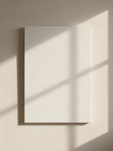 A minimalist typographic canvas print hanging on a warm off-white wall, soft afternoon window light casting long shadows, 35mm photography
