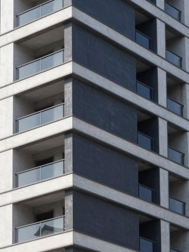 Architectural detail shot of a clean, modern building construction site, premium materials, crisp daylight, sharp focus