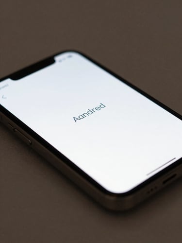 Macro shot of a physical Android phone displaying a clean, high-contrast minimalist interface with crisp typography, soft side-lighting, 35mm