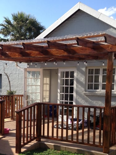 Pergola with balustrade allowing year round enjoyment for the whole family.