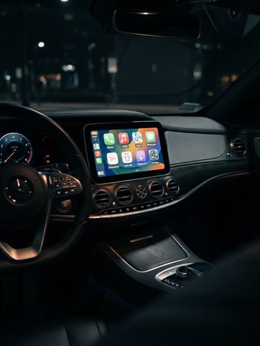 Macro shot of a luxury car dashboard, active CarPlay interface on a perfectly integrated screen, glowing LED dashboard lights, shallow depth of field, premium automotive photography