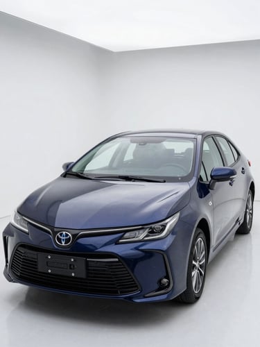 Close three-quarter front view of a dark blue Toyota Corolla parked on a white studio ground, overcast daylight, clean bodywork showing true finish, no reflections obscuring detail