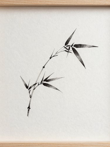 A minimalist charcoal ink painting of a single curved bamboo stem on textured off-white paper, framed in a simple light wood frame, cast in soft side-lit daylight.