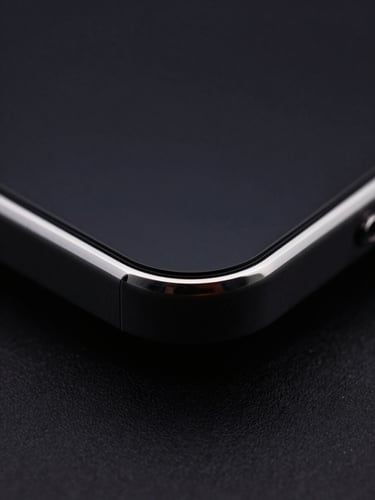 Extreme macro close-up of a grade 5 titanium chamfered edge of a luxury smartphone, sharp rim lighting, deep obsidian tones, shallow depth of field.