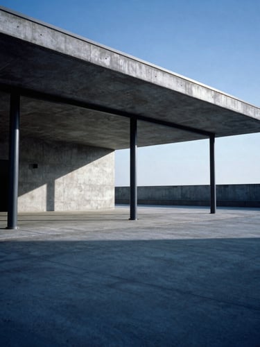 Wide-angle architectural photograph of a modern concrete and steel pavilion, sharp angular shadows, cool crisp daylight, 35mm