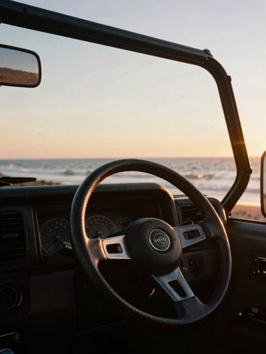 Low-angle shot of a steering wheel of an open-air 4x4 with a gorgeous ocean sunset backdrop, warm golden-hour light, 35mm film look.