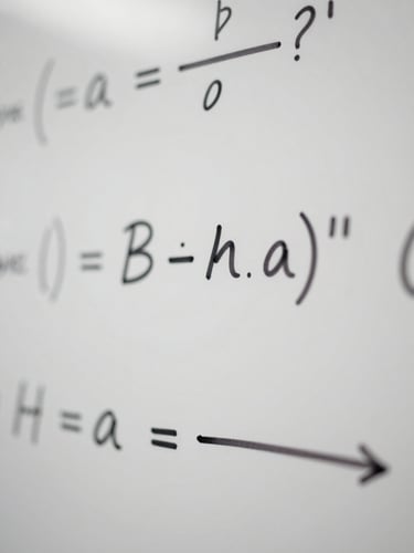 Macro close-up of handwritten mathematical derivations on a clean whiteboard, crisp neutral studio lighting, sharp details, analytical atmosphere.