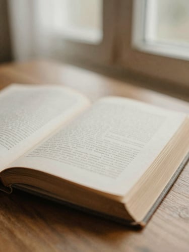 A close-up of worn book pages resting on a wooden table, soft morning window light filtering through, shallow depth of field, warm nostalgic tones.