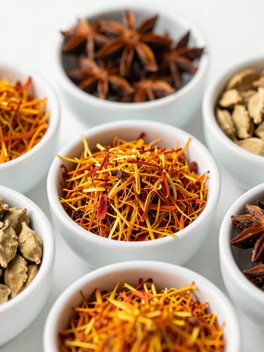 Bright editorial food photography, natural daylight, overhead flat-lay of vibrant whole spices in clean white ceramic bowls, saffron, cardamom, and star anise, crisp composition, shallow depth of field