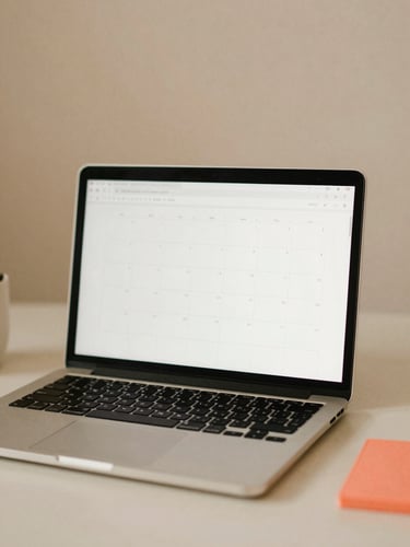 Warm editorial close-up of a minimalist organized workspace with a laptop showing a clean calendar, soft morning daylight, beige tones, 35mm photography