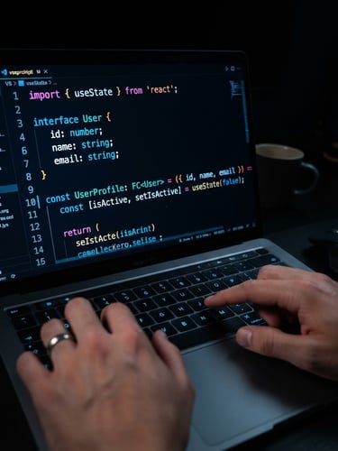 Sleek dark-mode technology photography, close-up of a high-contrast code editor on a dark screen, subtle neon blue highlights on the keyboard, sharp focus on lines of clean code, 35mm lens
