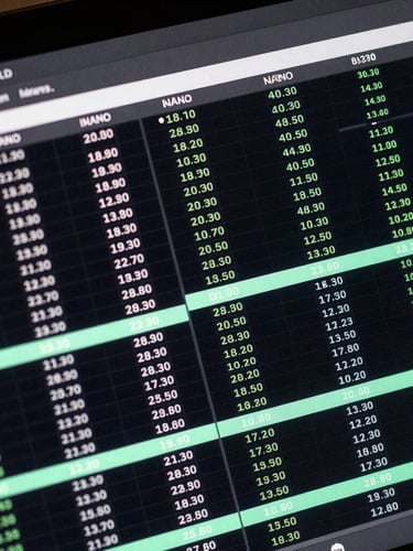 Macro close-up shot of a dark digital interface showing a real-time property inventory grid, active units highlighted in neon-mint, high-contrast data visualization on an obsidian screen