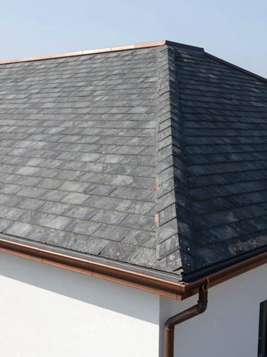 Crisp architectural detail of a newly completed slate roof with copper gutters, bright natural daylight, sharp focus on perfect seams.