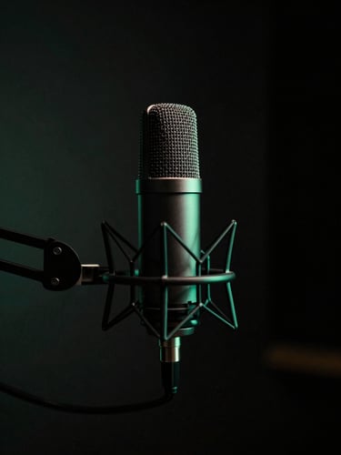 Cinematic low-key photo of a professional podcast studio setup, high-end microphone in focus, dark background with subtle green ambient light.