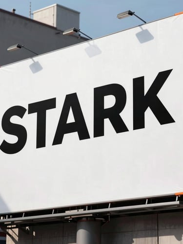 Stark high-contrast close-up of a massive physical billboard in an industrial district, hard-shadowed daylight, safety orange accents visible on paper edges, raw street-level composition.
