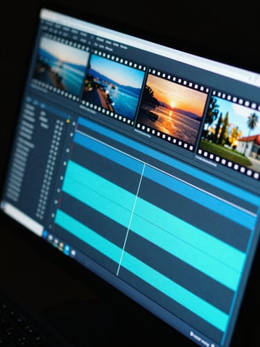 Extreme close-up of a high-resolution monitor displaying motion graphics timelines and color-graded film frames, shot from a low 45-degree angle in a dark studio, electric blue and cyan light bleeding across the screen surface, deep blacks surrounding the monitor, technical precision in every detail, no people visible