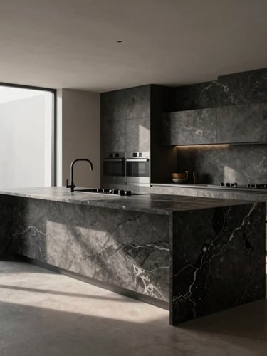 A monumental kitchen island made of dark veined quartz sinter, soft window light casting long shadows, modern minimalist kitchen interior, wide architectural shot.