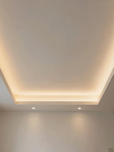 Symmetrical modern living room interior looking up at a tiered gypsum ceiling with soft golden indirect LED lighting, clean white plaster, minimalist architecture, 35mm