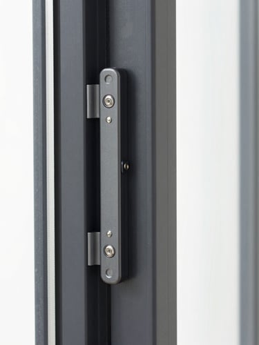 Close-up of a sleek, heavy-duty multi-point locking mechanism on a modern dark grey UPVC door frame, architectural photography, bright crisp daylight, sharp focus, clean white background.