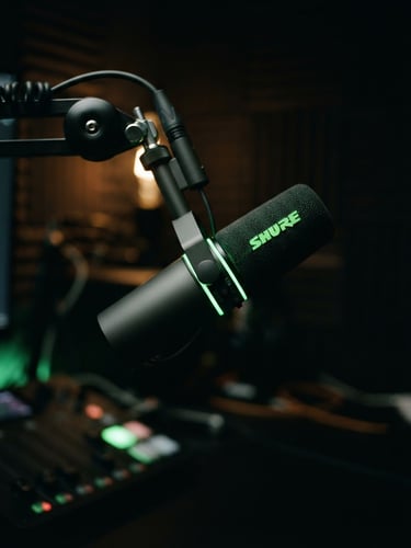Moody studio photography of a professional podcasting setup, dynamic close-up of a high-end broadcast microphone under dramatic low-key lighting with sharp electric neon green accents, shallow depth of field, 35mm