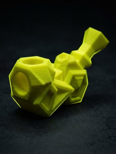 Macro shot of a neon yellow 3D printed geometric pipe on a matte black surface, sharp yellow rim lighting, high contrast