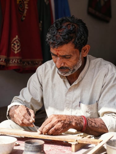 An authentic close-up of a local Hanumangarh artisan working diligently in their shop, bright natural daylight, rich warm tones, sharp focus