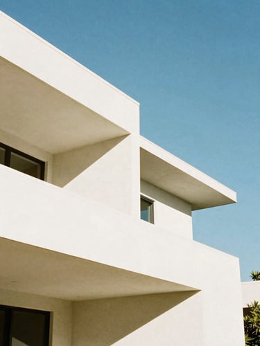 Minimalist architectural detail of a modern Sarasota estate, clean white concrete lines against a bright blue sky, soft geometric shadows, 35mm lens