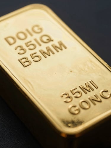 Macro detail of a solid gold bullion bar with stamped serial numbers and refinery seal, dramatic side-lighting with deep shadows and rich metallic gold highlights, sharp architectural focus, 35mm