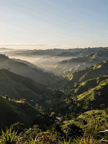 Wide panoramic view of Coclé highlands at sunrise, mist rising from deep green valley, soft morning light, negative space on the left.