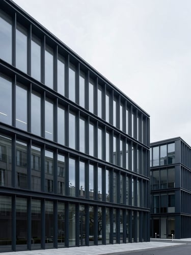 Wide architectural perspective of a modern minimalist office building with clean steel and glass lines, cool overcast daylight, deep navy tones, 35mm.