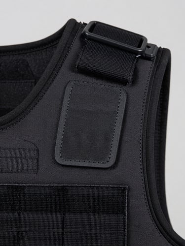 Macro detail shot of heavy-duty nylon tactical vest stitching, high-contrast studio lighting, neutral gray background, sharp focus