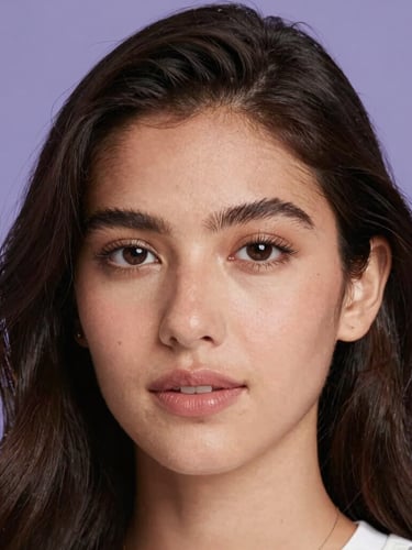 Minimalist editorial portrait of a young woman with elegant styling, soft lilac studio lighting, high-fashion composition, 85mm lens