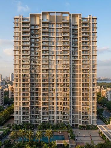 Bright architectural wide-angle photo of a modern residential tower exterior in Vikhroli East, warm afternoon sunlight casting soft shadows on clean concrete facade.