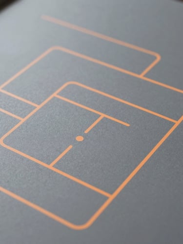 Overhead system map of a decision layer, clean technical diagrams with soft orange accent lines on a matte grey surface, diffused lighting