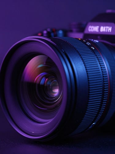 Macro shot of a high-end camera lens and studio lighting setup, moody purple and blue rim lights, dark technology aesthetic