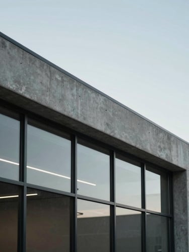 Architectural details of modern Utah workspaces, soft overcast daylight, clean concrete lines and steel frames, minimalist composition, 35mm