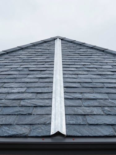 Low-angle architectural shot of a high-end residential slate roof with precise zinc seams under a soft overcast daylight, crisp detail, 35mm lens