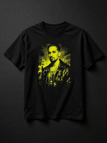 Full-height portrait frame: a black oversized t-shirt displayed as a crisp flat lay on a matte ink-black surface, the artist's graphic print centered on the chest — theatrical top-down studio lighting with a single focused beam, deep shadows at the edges, electric yellow-green graphic detail visible on the print, no background clutter